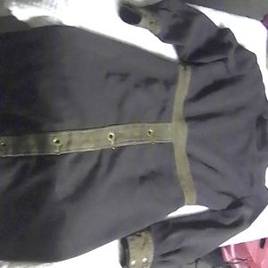 Brown wool and light brown leather.dress from the mid to late 60's. Homade